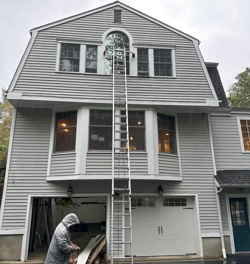 This round top window in Wilton is three stories up 